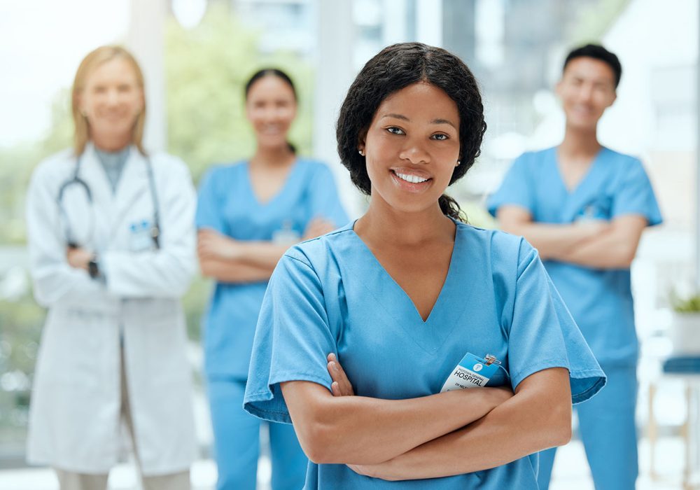 Ready and bright-eyed. Shot of a group of medical practitioners standing together in a hospital